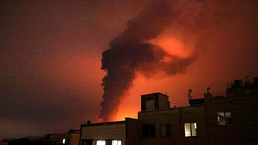 Explosions erupt following strikes at the Shahran oil Refinery in Tehran on 7 March 2026. Credit: ATTA KENARE / AFP via Getty Images